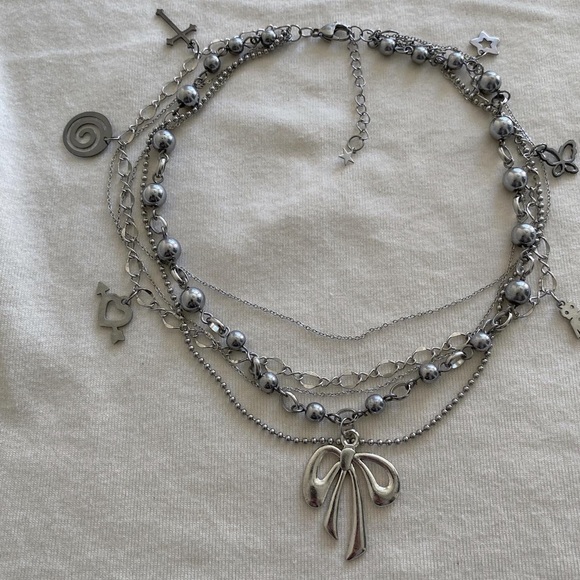 Charm necklace with bow pendant - Picture 2 of 2